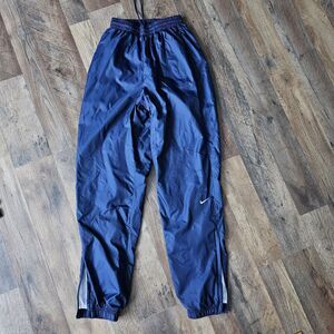 Vintage 90s Nike Track Pants Women's S Blue Lined Zip Ankle Tapered Pockets Logo